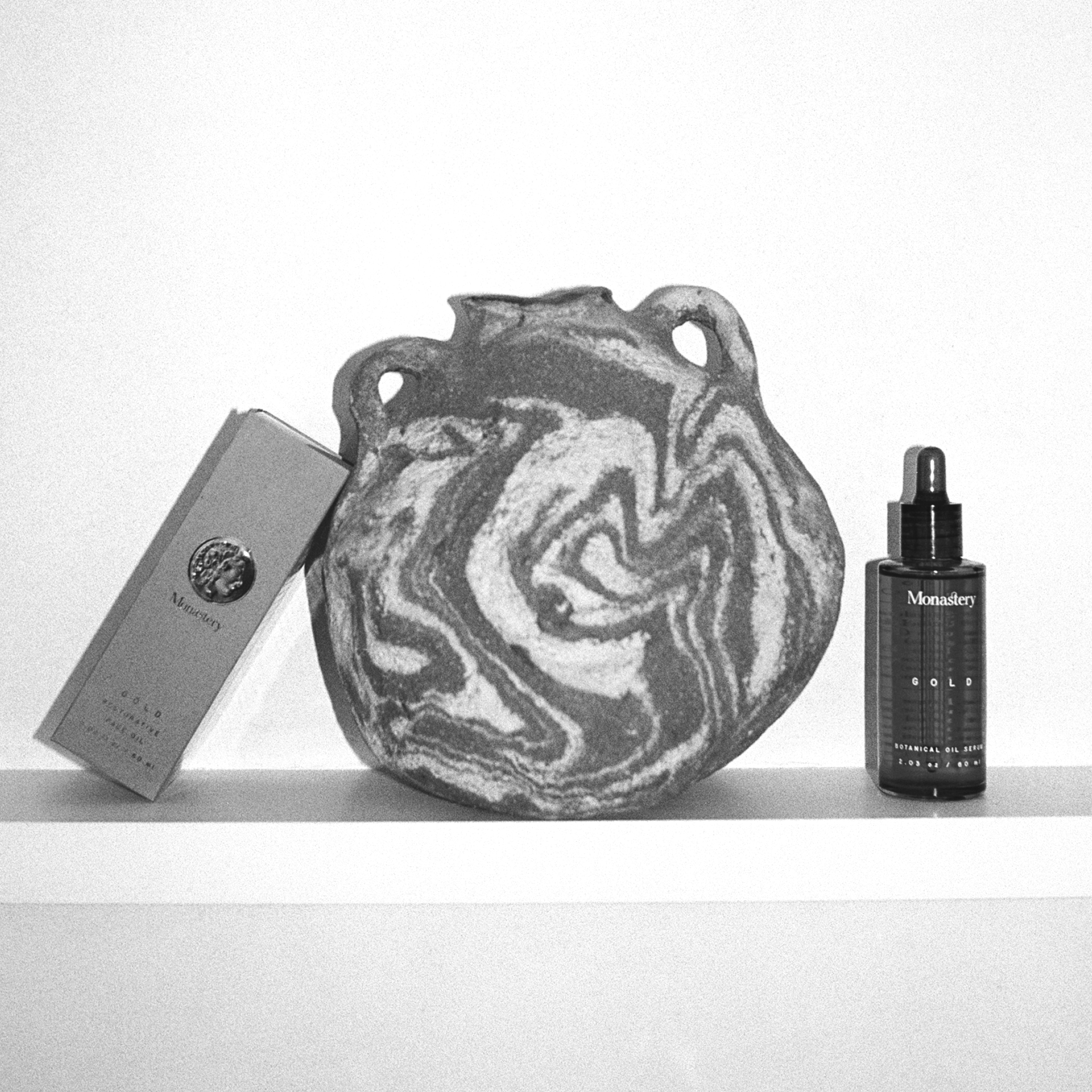 Monastery-branded products with an antique-looking pot