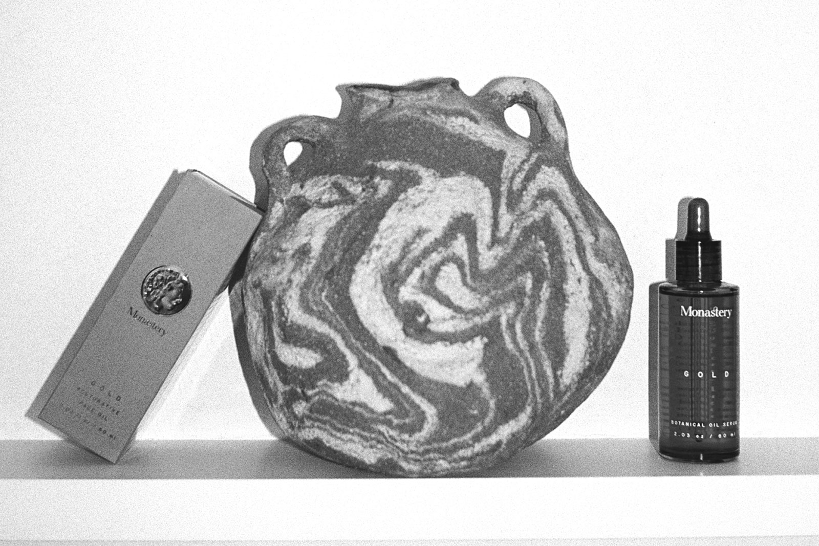 Monastery-branded products with an antique-looking pot