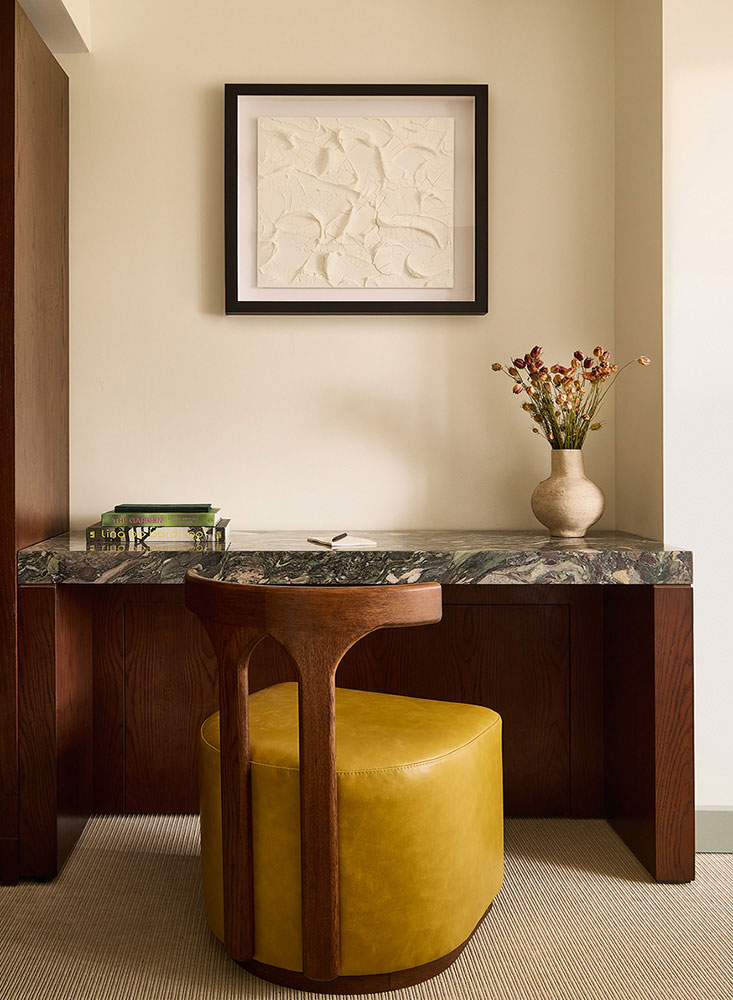 built-in desk with leather and wood chair